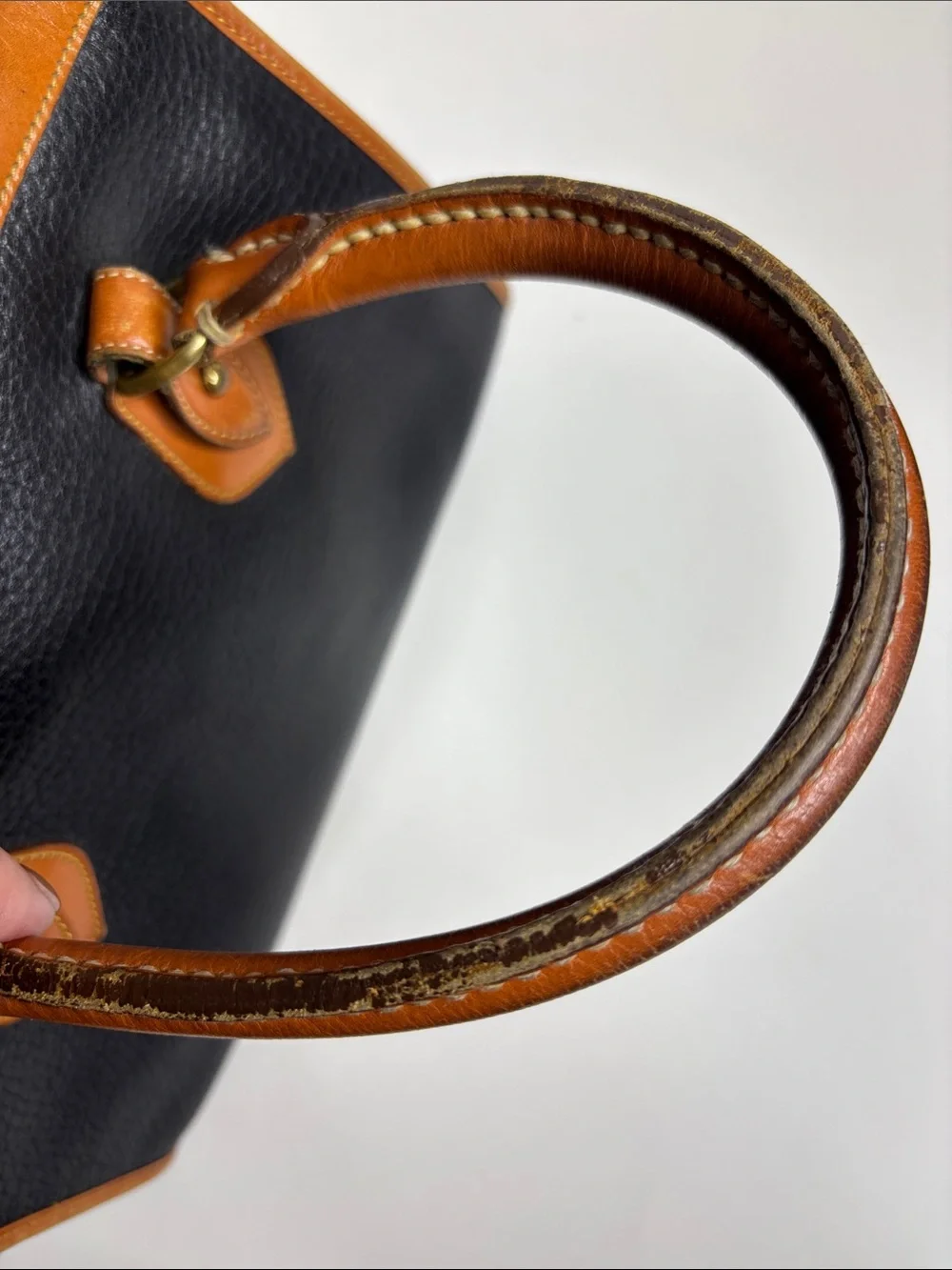 Dooney & Bourke Black Pebbled Leather Satchel with Tan Trim